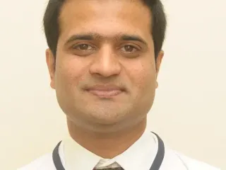 Dr. PRAMOD R C
